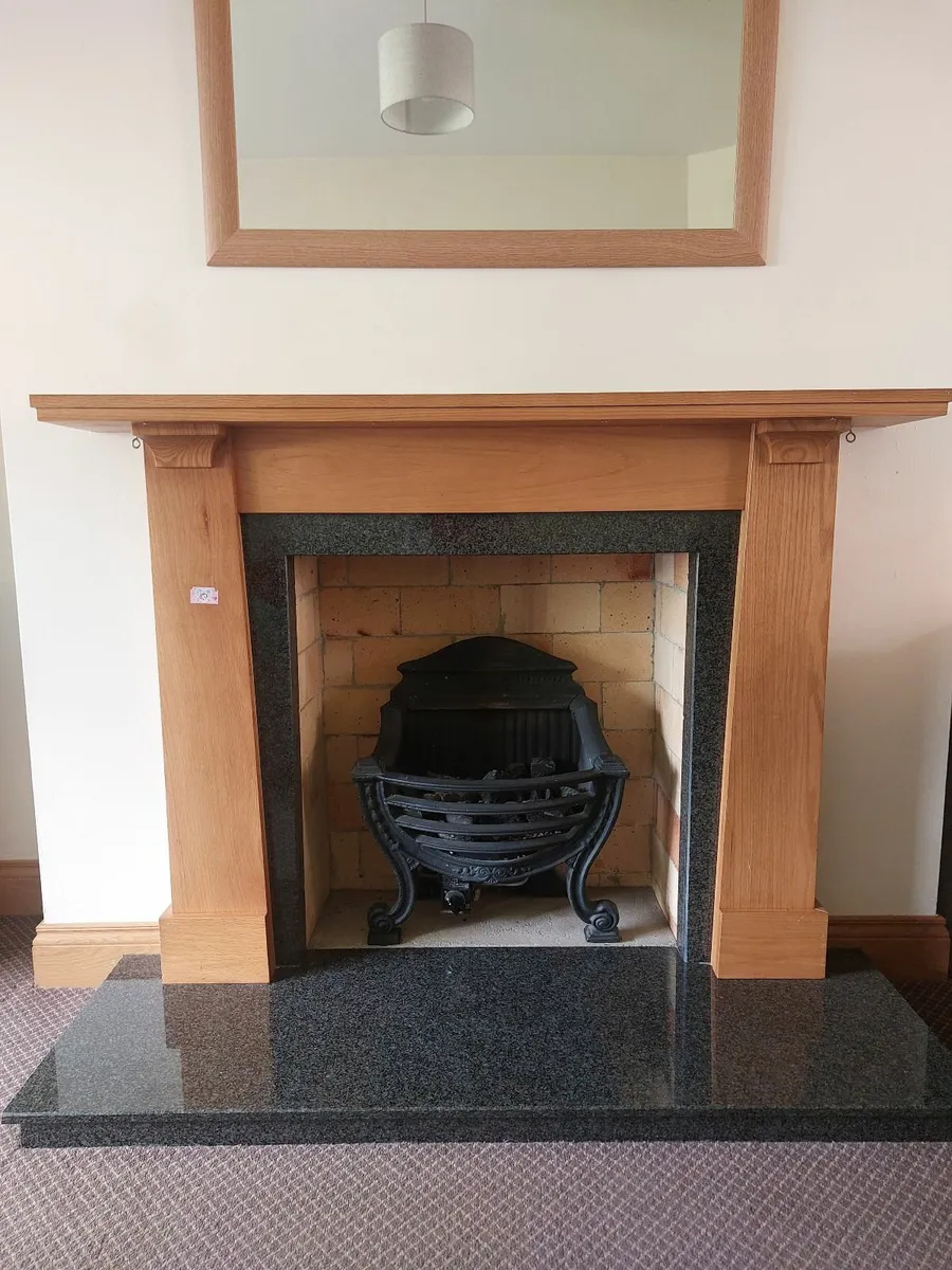 Solid oak frame with marble surround and base. - Image 1