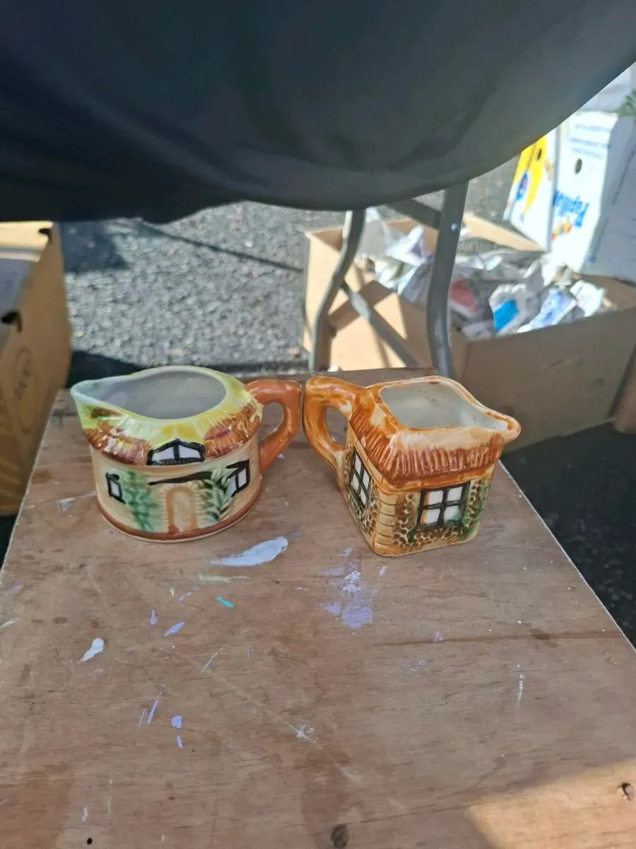 2 house milk jugs postage possible