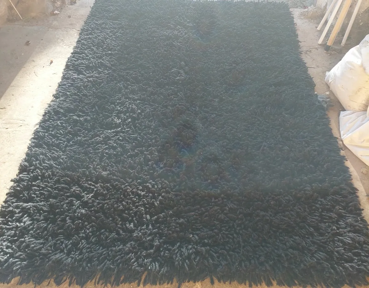 Black shaggy rug