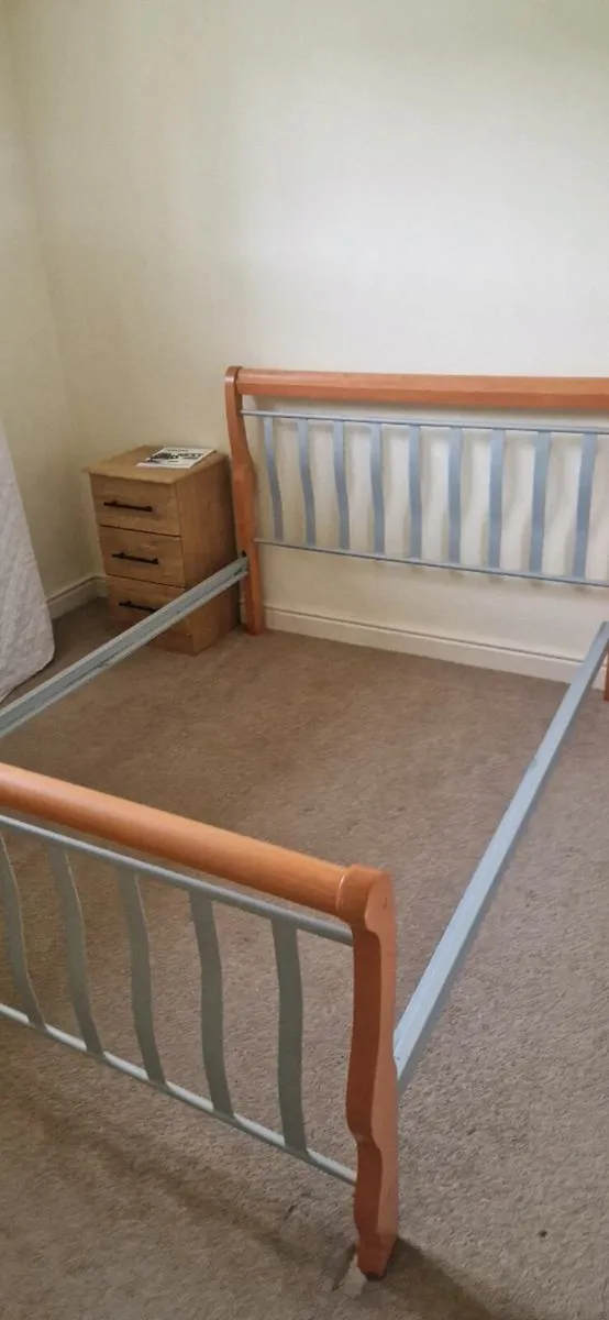 Wooden and steel frame bed frame