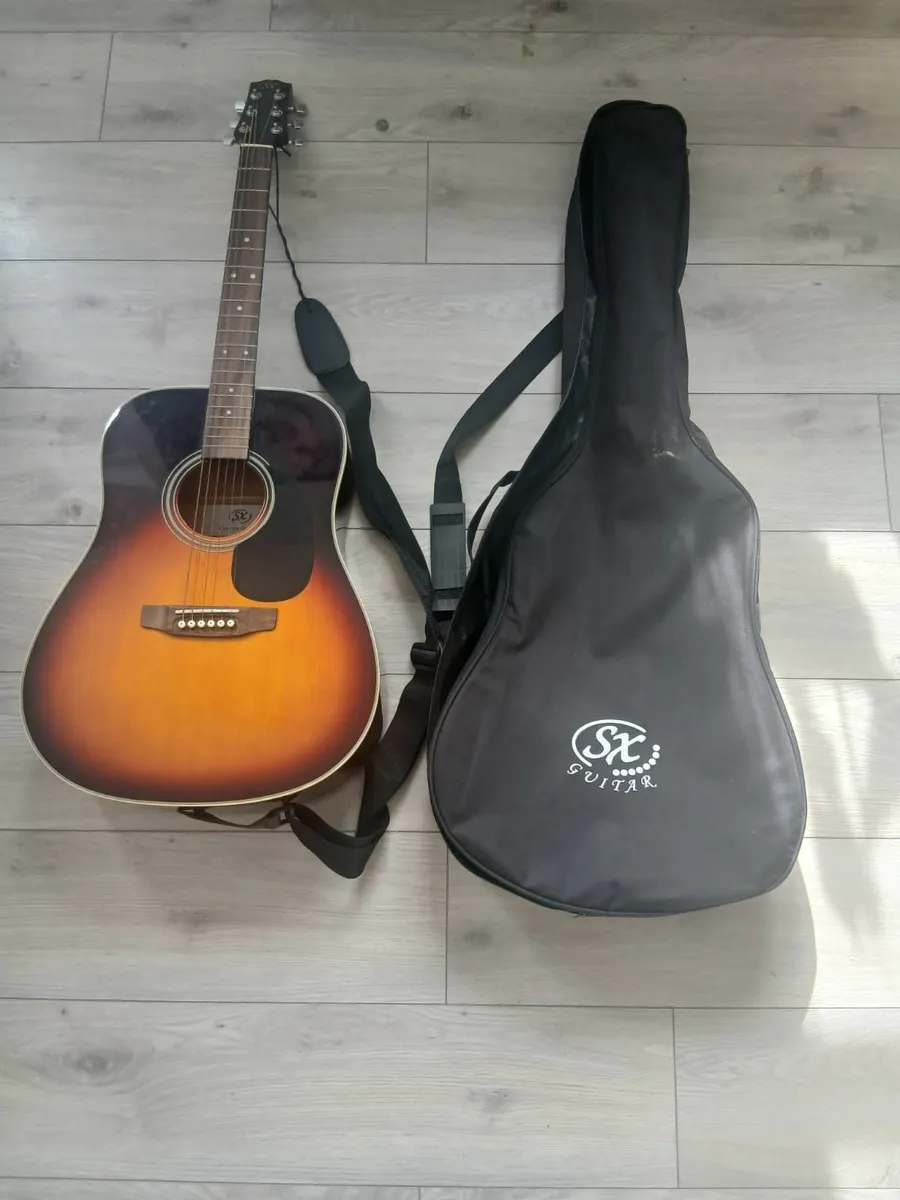 Brand new guitar & case - Image 1
