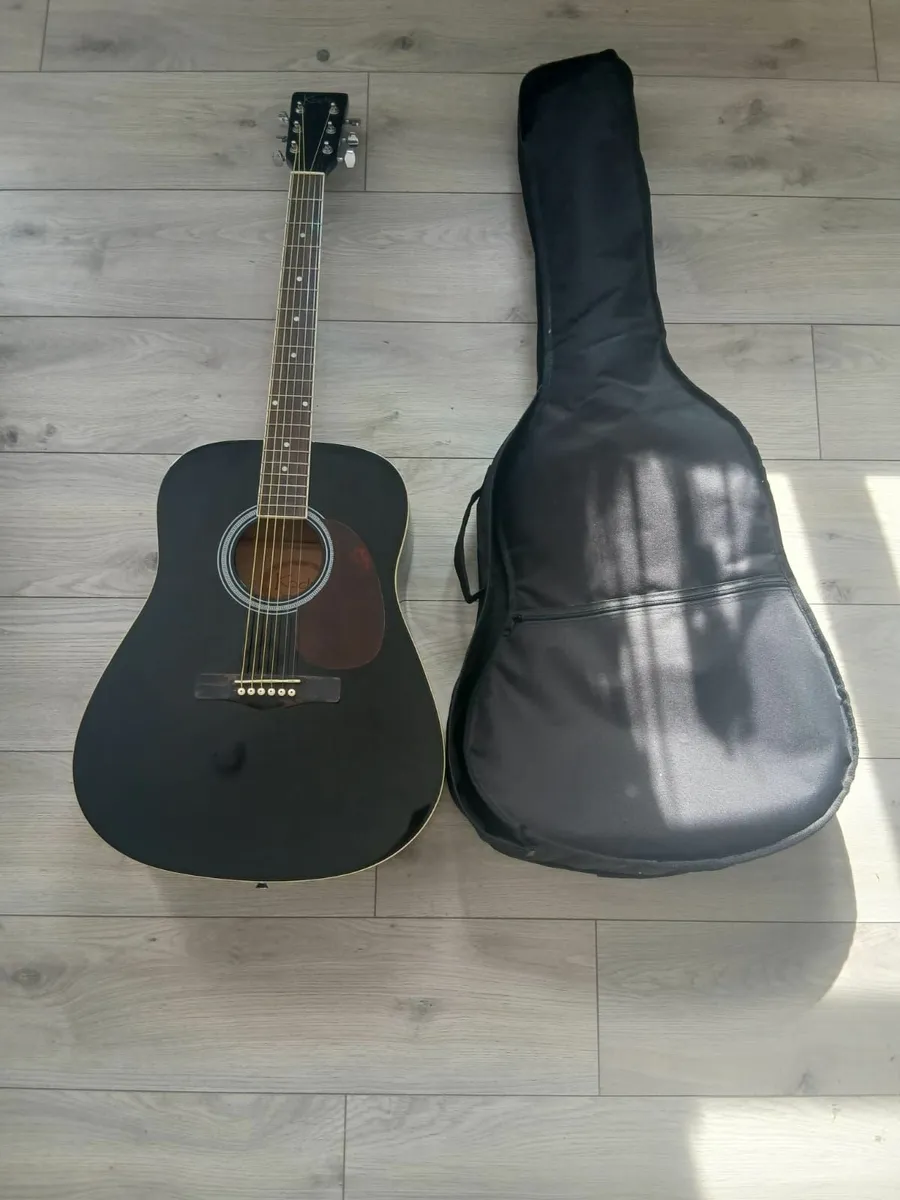 Brand new guitar & case - Image 1