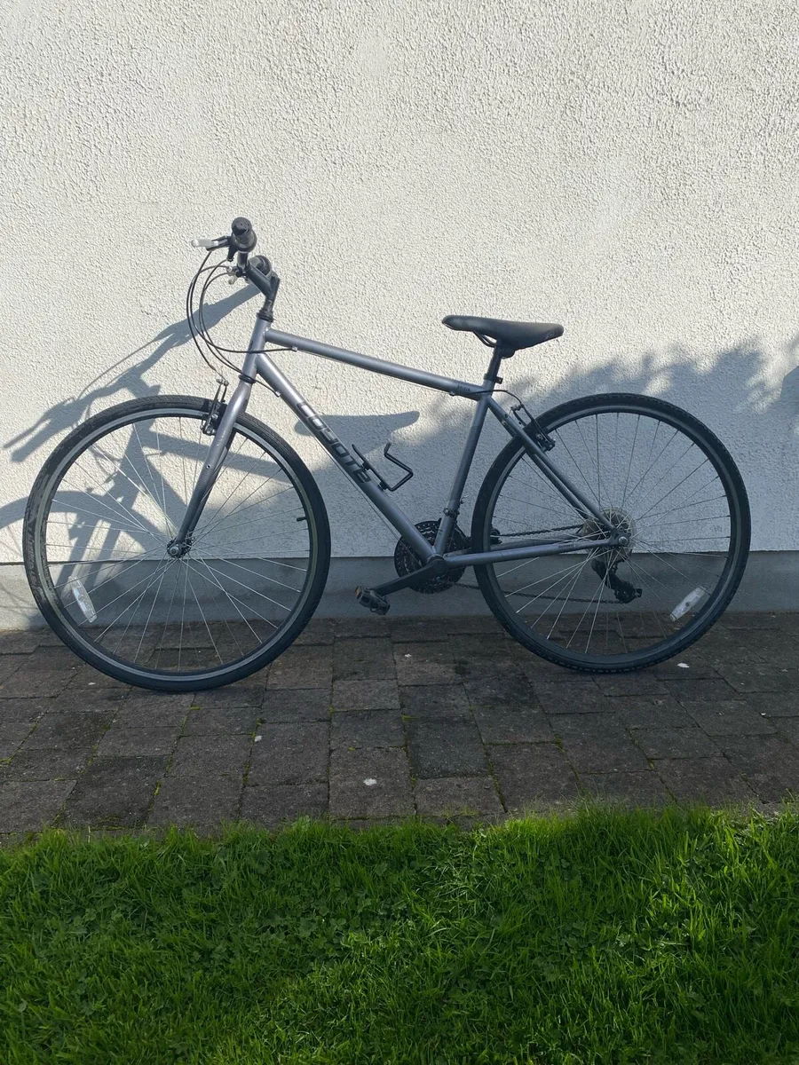 Grey hybrid bike - Image 1