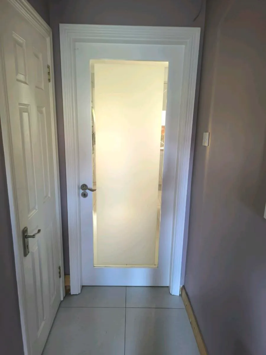 Two Seadec clear glazed Internal doors