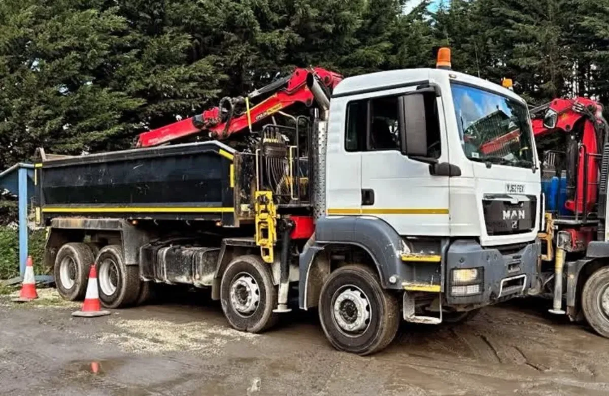 Man Grab Truck - Image 1