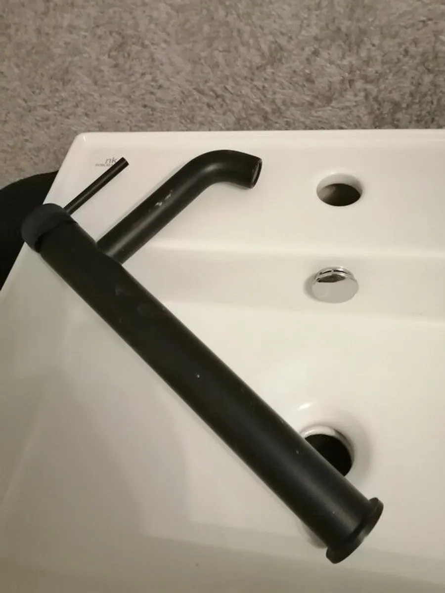 bathroom sink. - Image 1