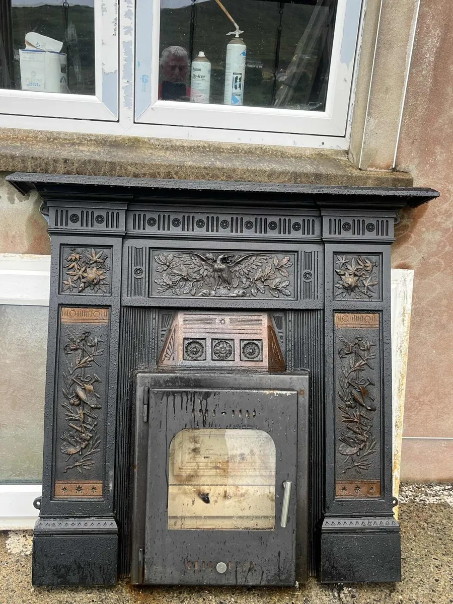 Fireplace surround with door.