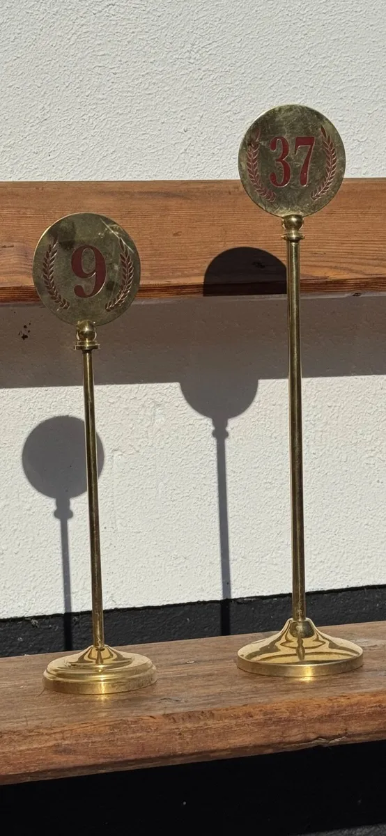 Assorted vintage brass table order numbers. - Image 1