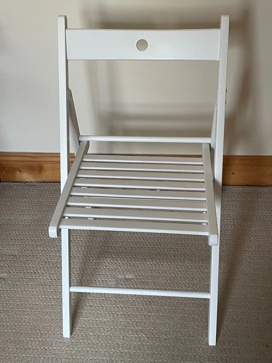 2x White  fold up wooden chairs.