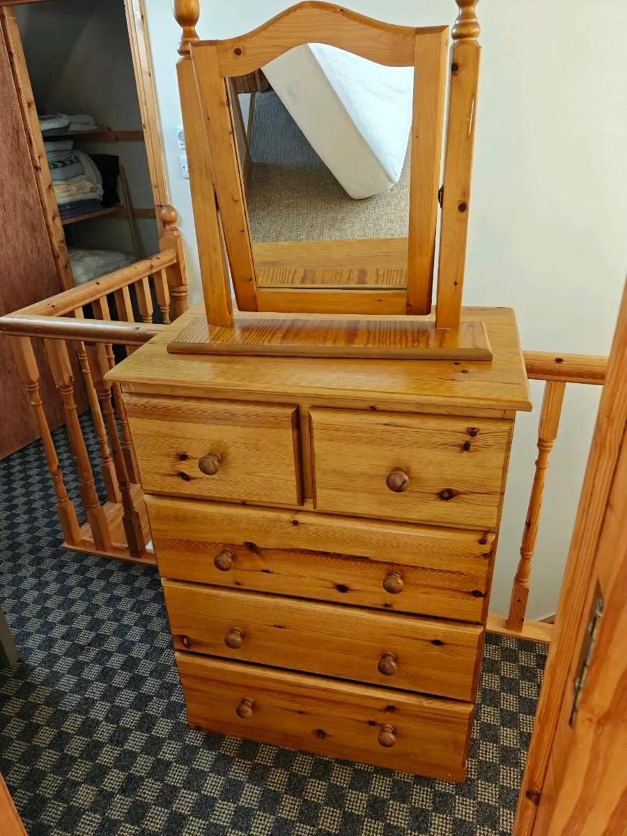 Chest of drawers and mirror