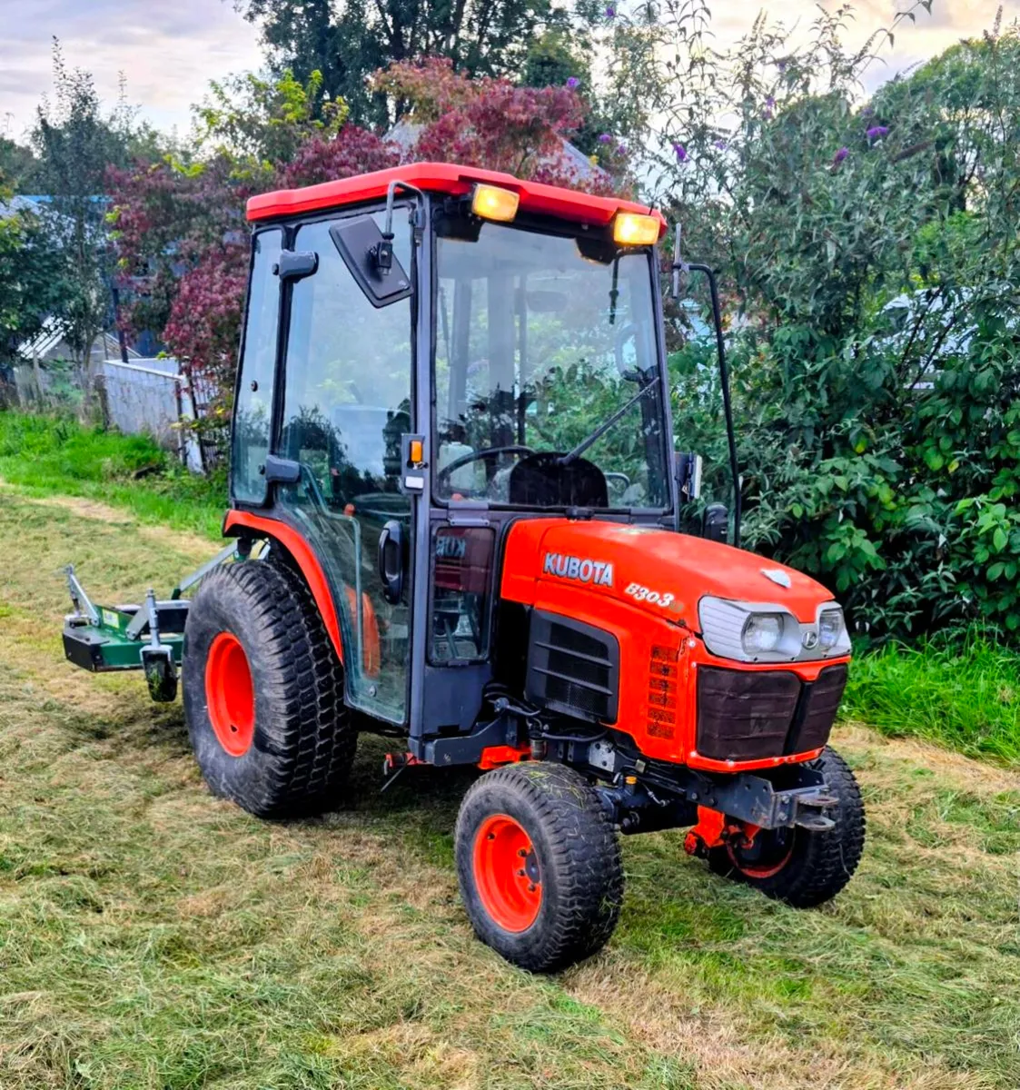 Kubota Tractor and mower - Image 1