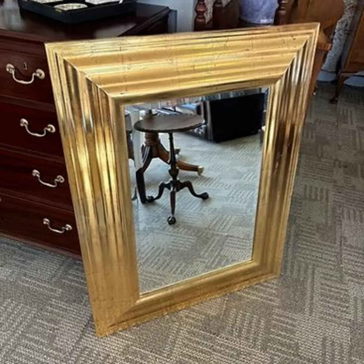 Beautiful ornate distressed bevelled wall mirror.