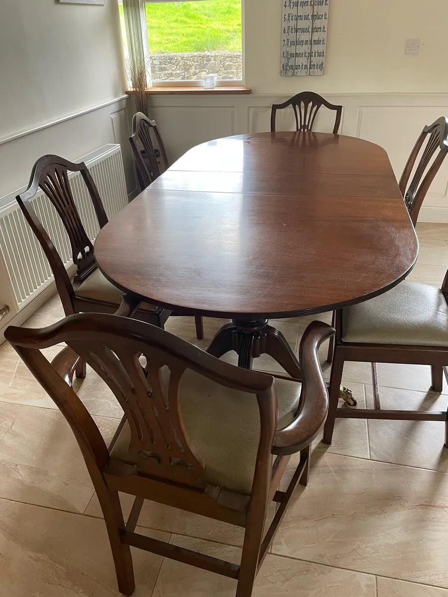 Dining table and 8 chairs - Image 1