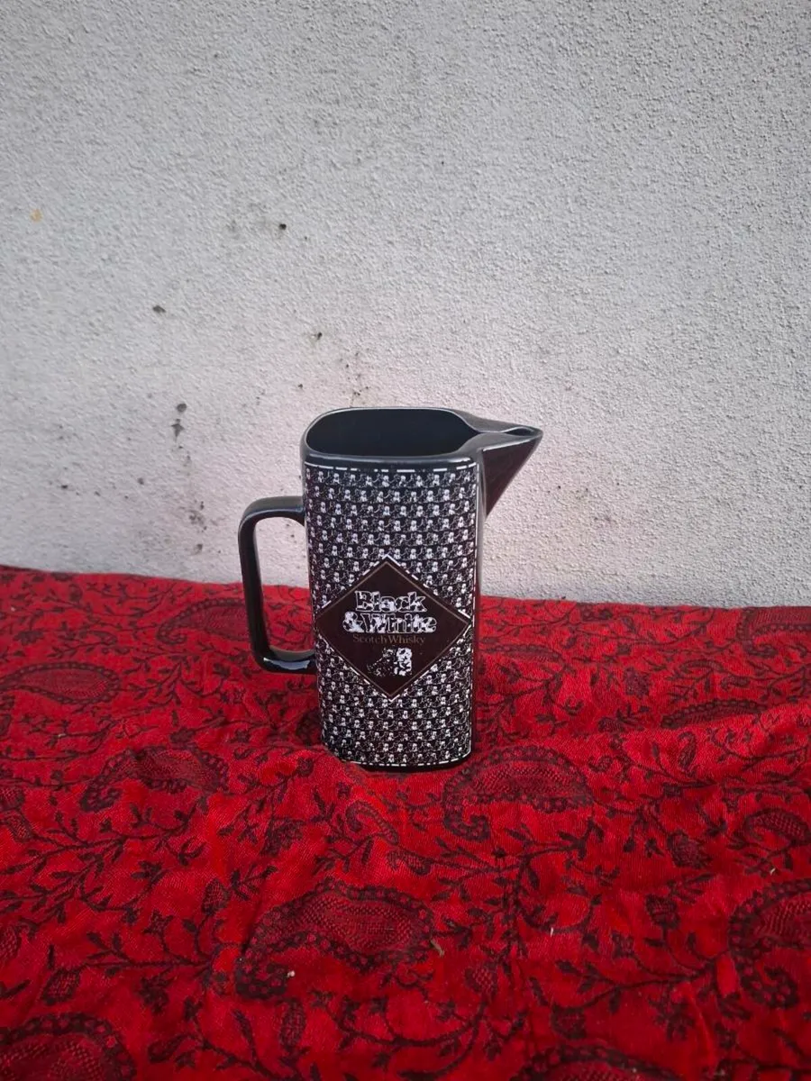 Black and white whiskey pitcher