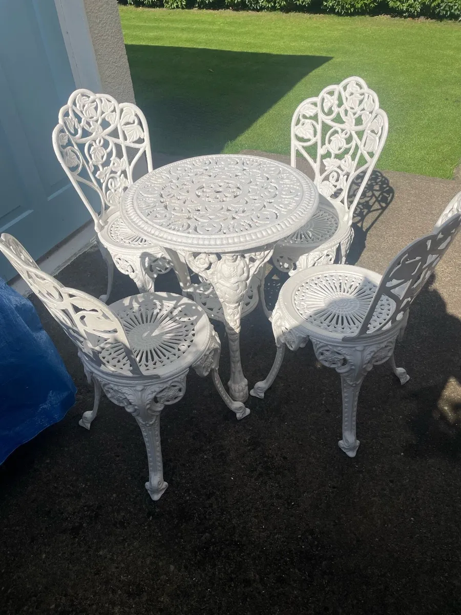 Cast iron table and chairs for sale - Image 1