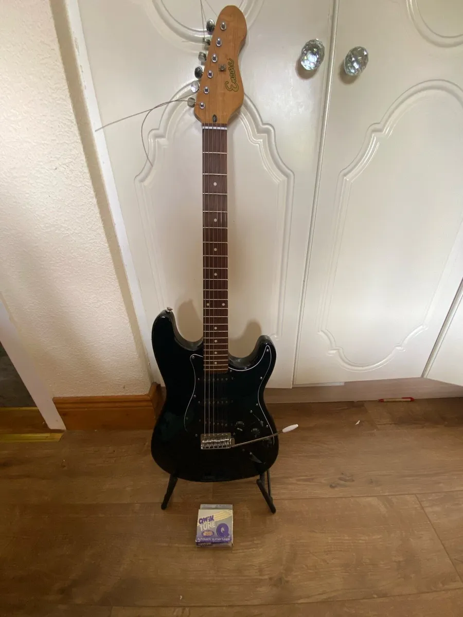 Encore electric guitar with stand and guitar tuner - Image 2