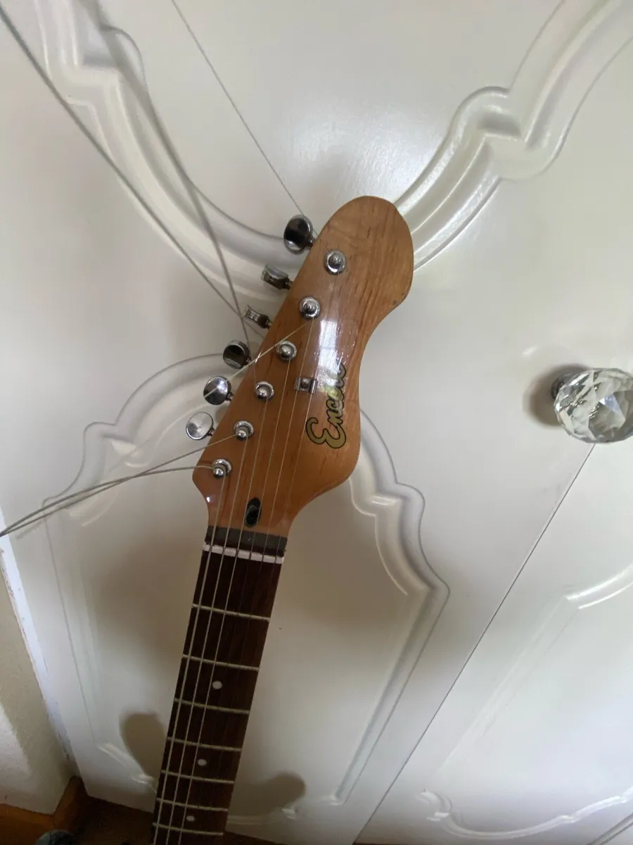 Encore electric guitar with stand and guitar tuner - Image 3