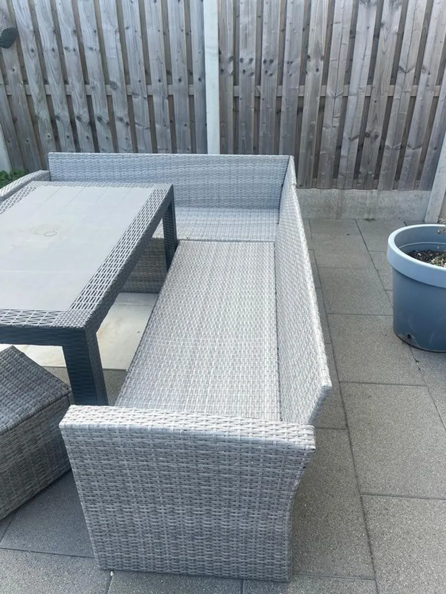 Outdoor L Seater Couch, Table and Stools. - Image 1