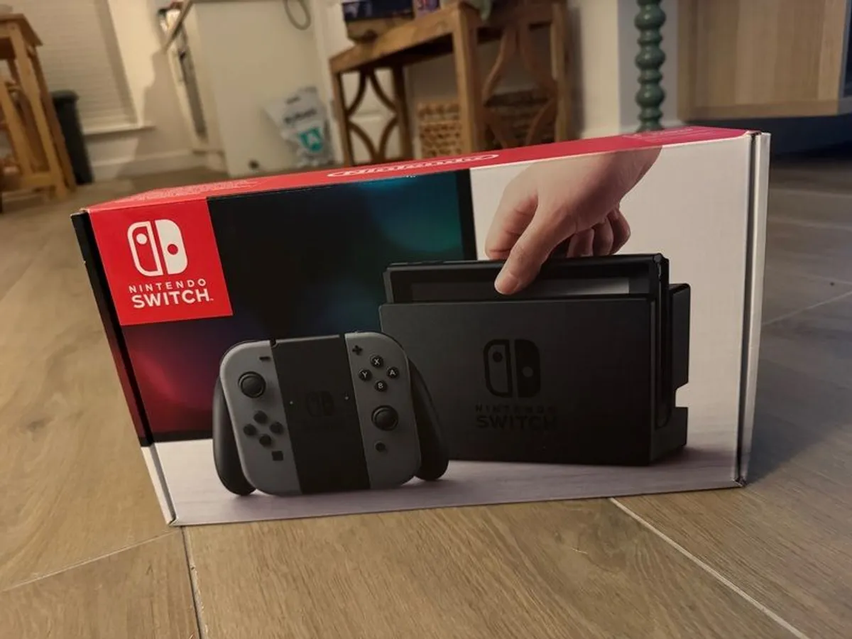 Nintendo Switch (and free carrying case) - Image 1
