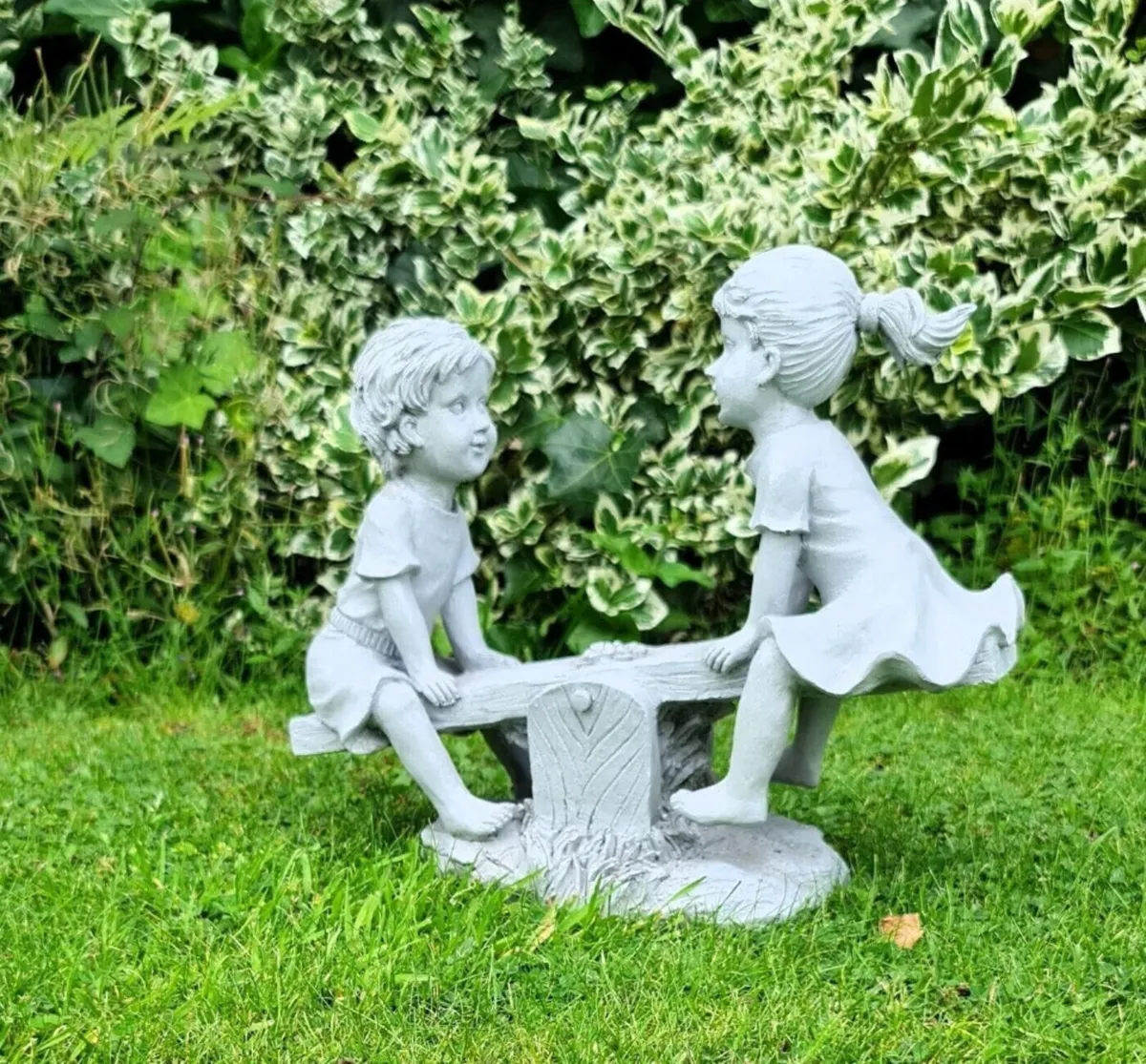 Garden Ornament Boy and Girl Seesaw Stone Effect - Image 1
