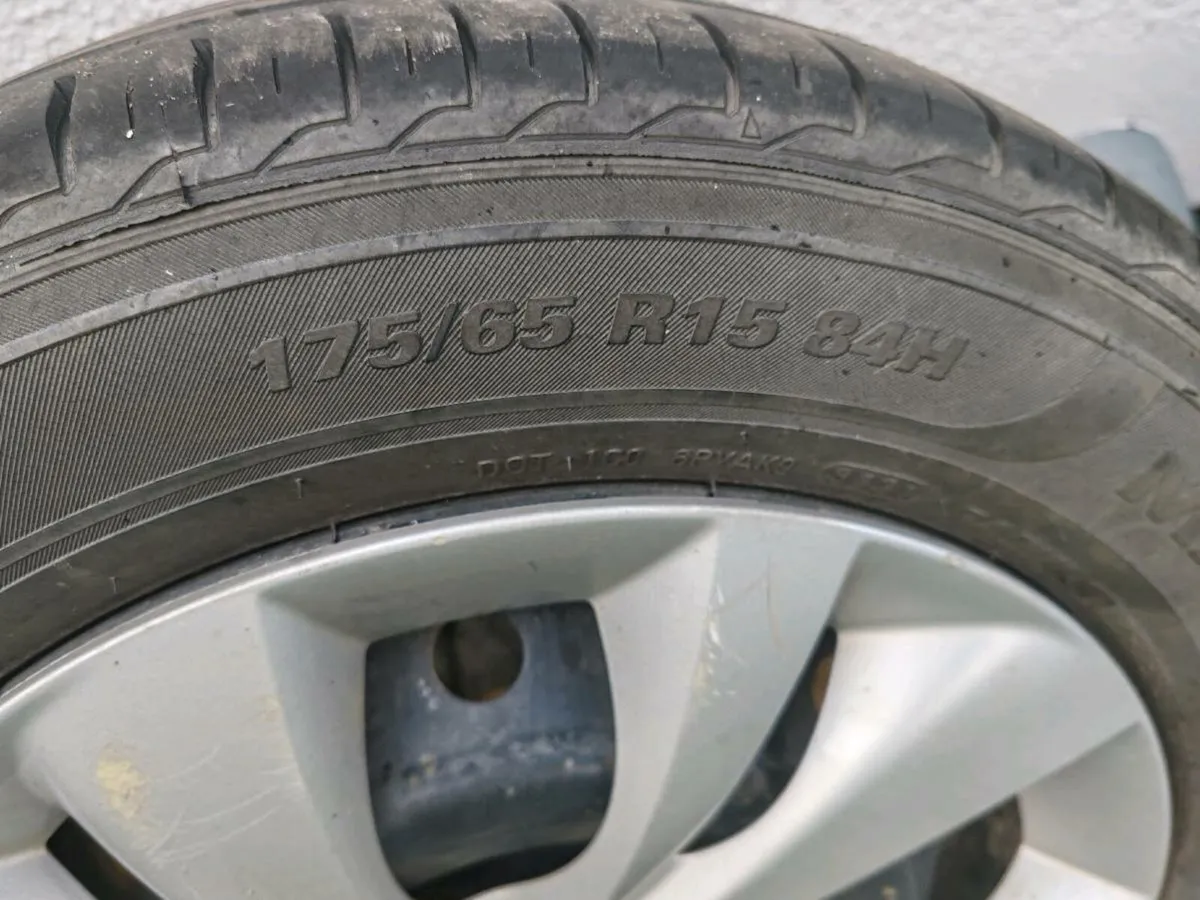 Suzuki swift steel rims with tires and hub caps - Image 4