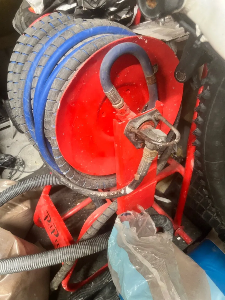 Powerwasher hose and wheel - Image 1