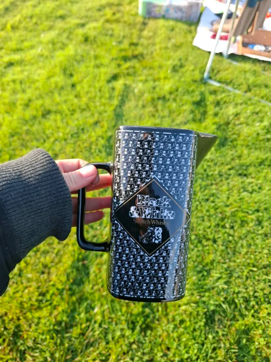 Black and white pitcher postage possible