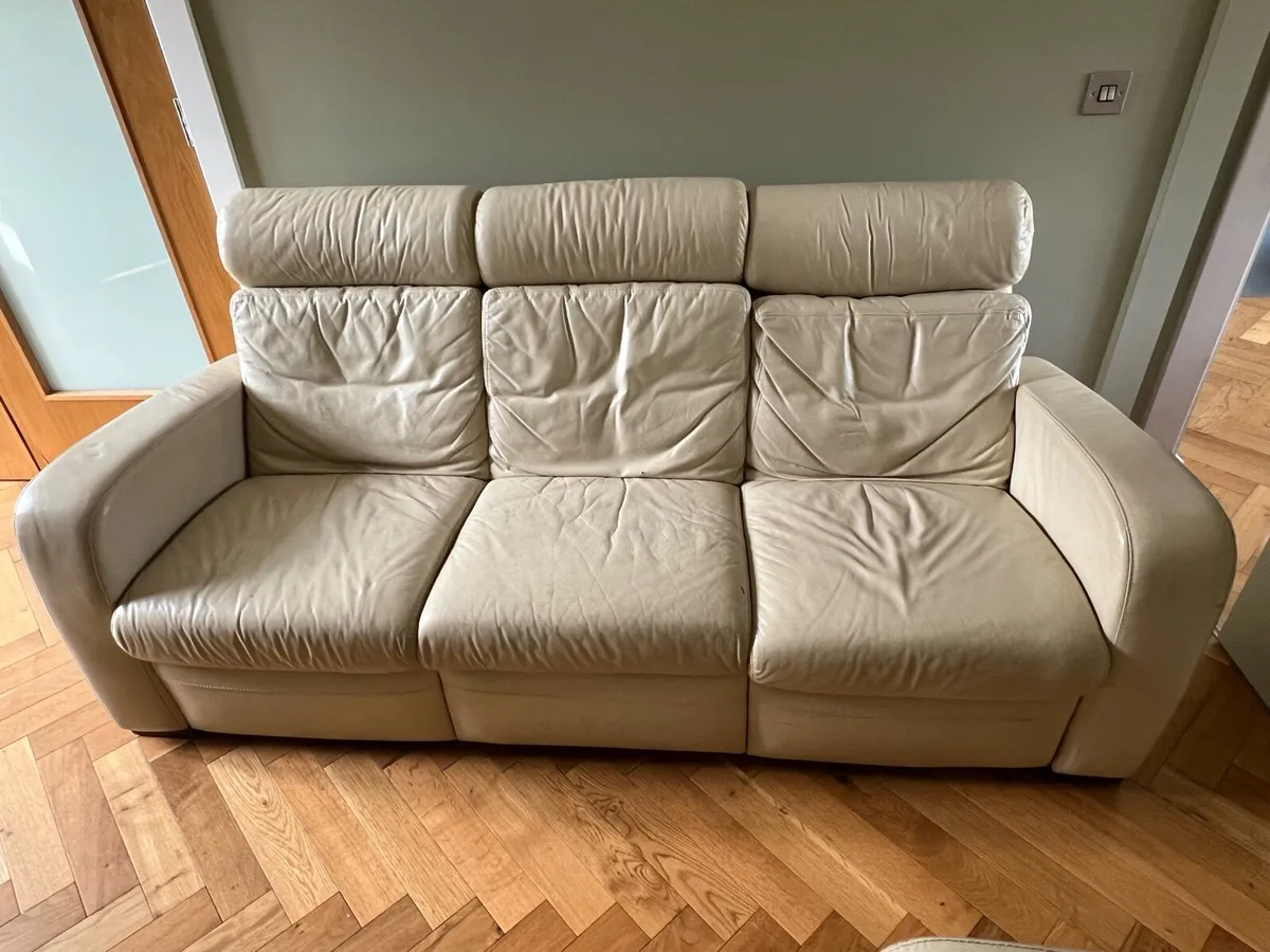 Cream leather sofa recliner - Image 1