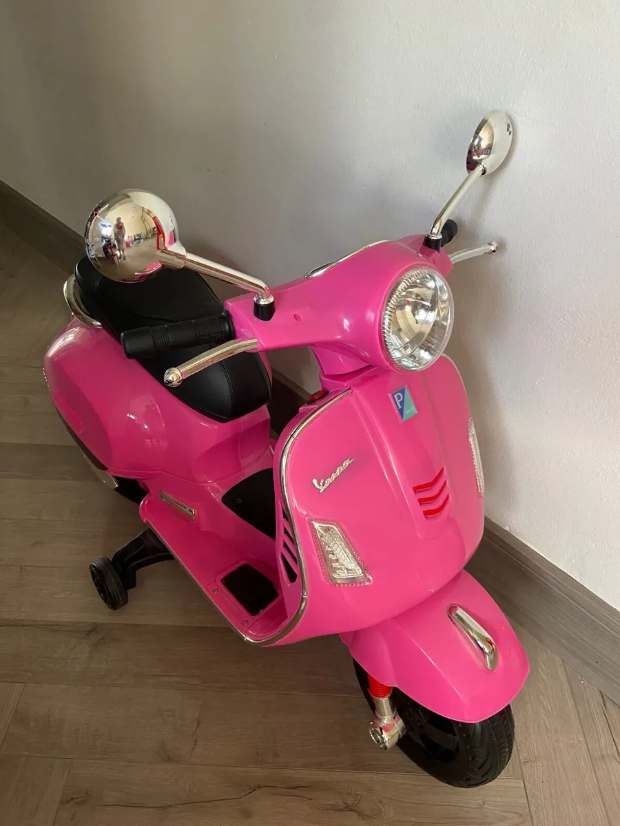Electric ride on Pink Scooter - Image 1