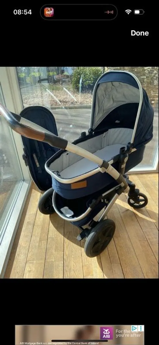 Beautiful Jools Geo Travel system. Baby Baby basket changes to Buggy, footmuff and rain cover included. - Image 1