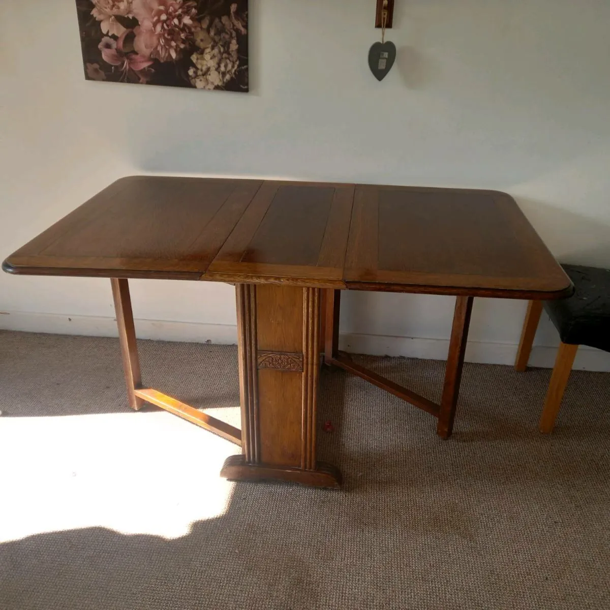 Wooden extendable dining table - Image 1
