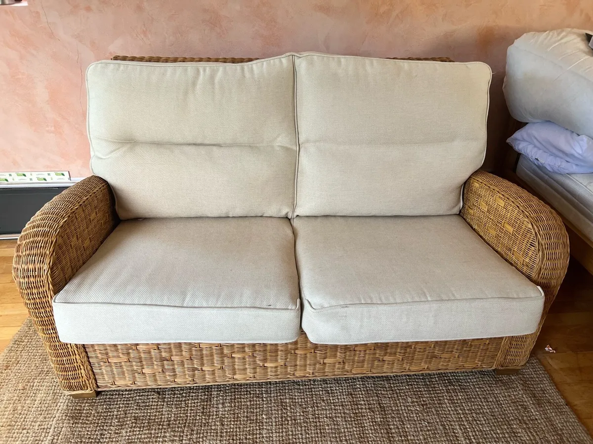 Wicker and cream 2 seater sofa - Image 1