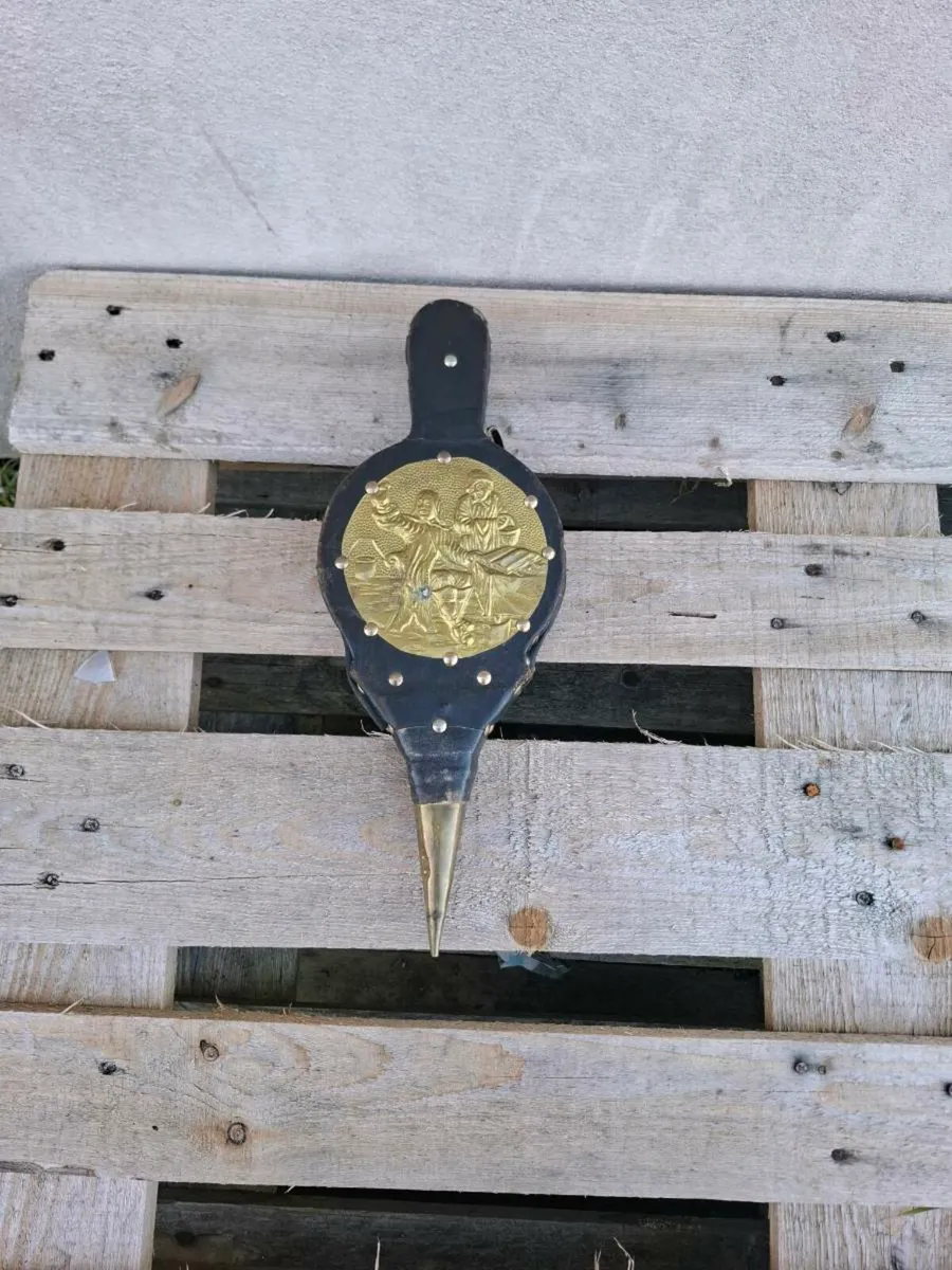 Brass and leather bellow