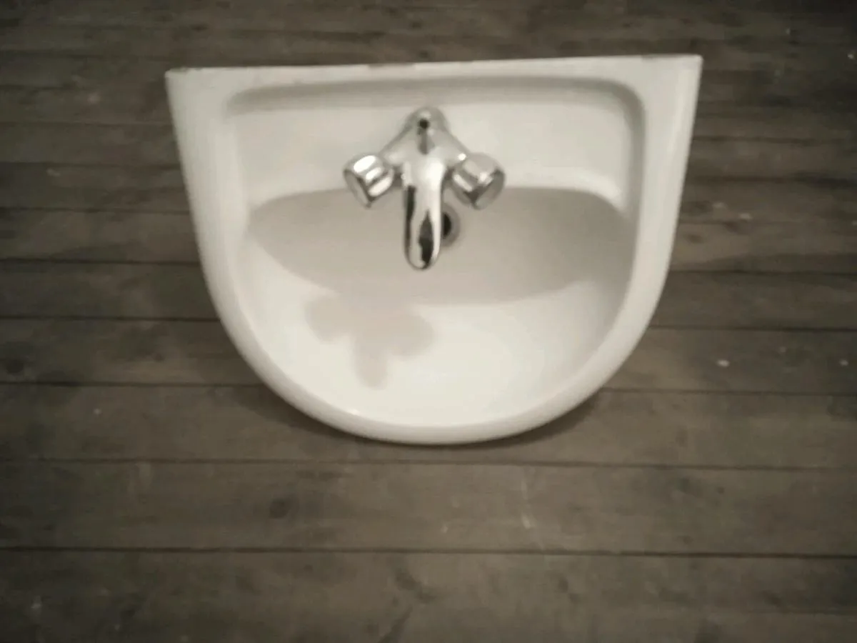 Single basin with taps