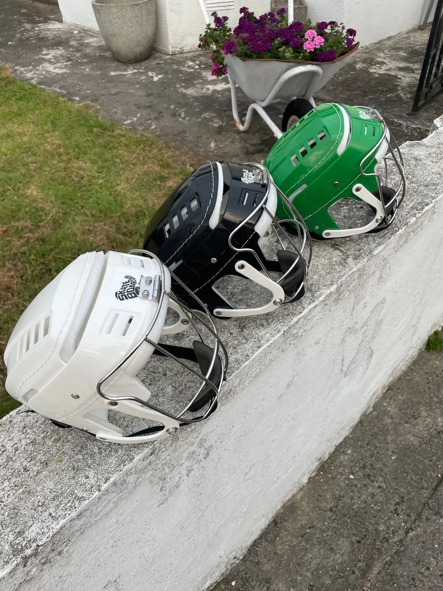 Skateboarder Hurling Helmets - Image 2