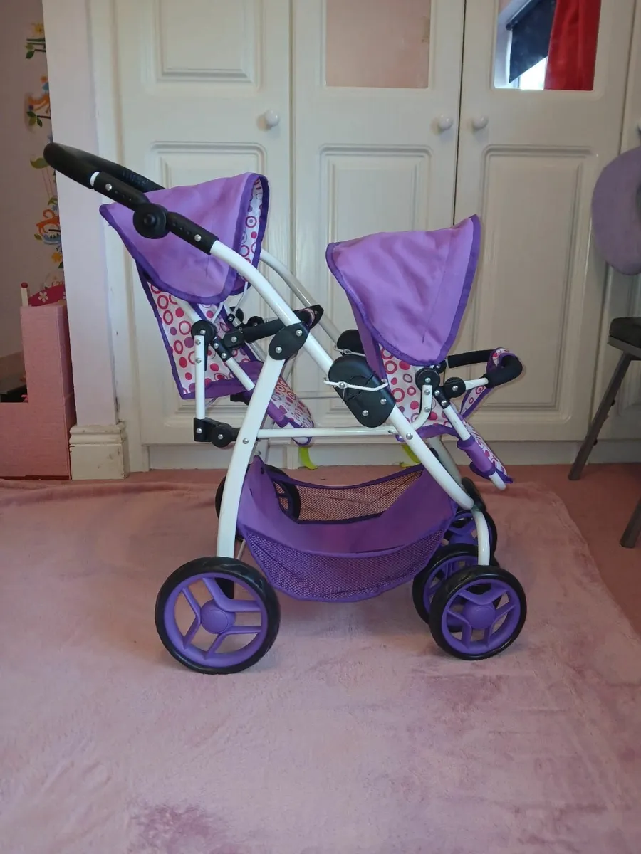 Doll's tandem stroller
