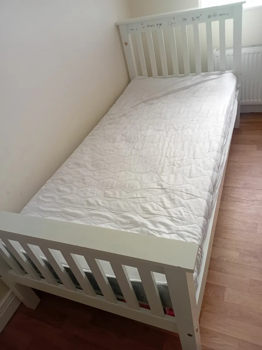Single wooden bed