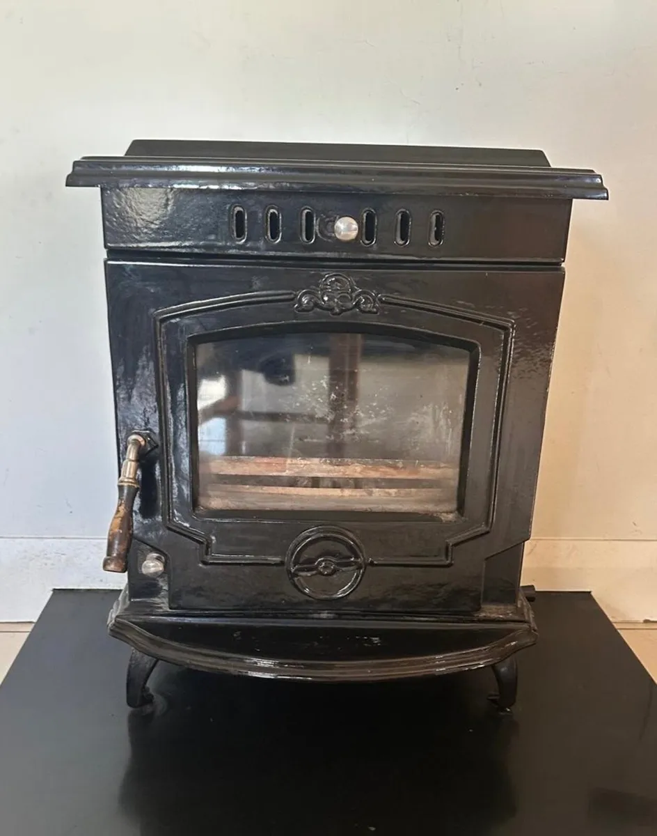 Olymberyl Black Enamel Stove and Hearth - Image 1