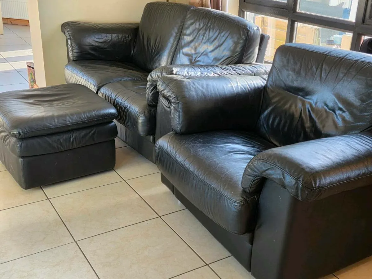 Black Leather 2 piece suite and Footrest- DFS - Image 2