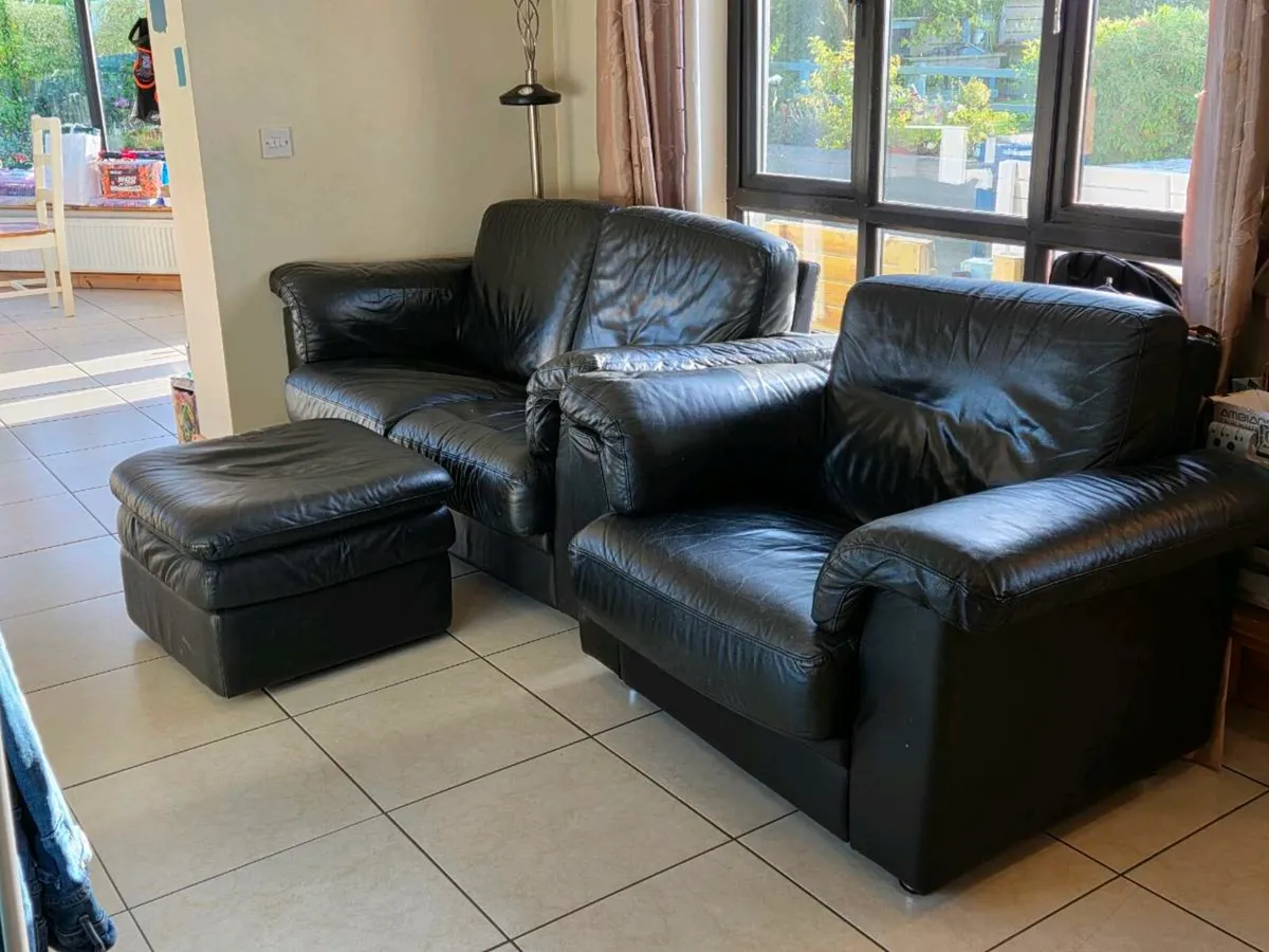 Black Leather 2 piece suite and Footrest- DFS - Image 3