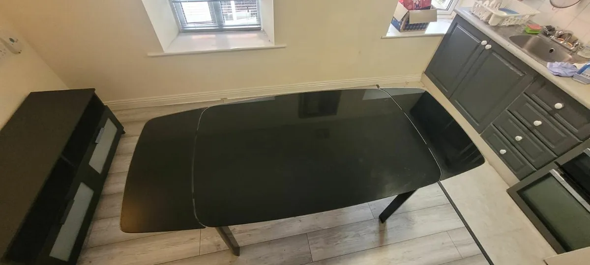 Extendable Black Glass Dining Table – Modern & Sty - Image 1
