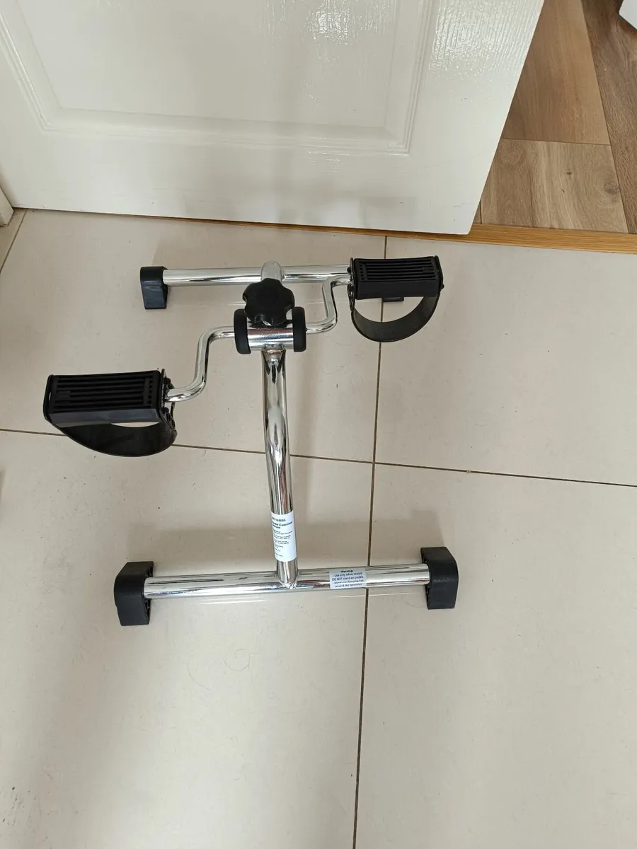 Seated pedal exerciser