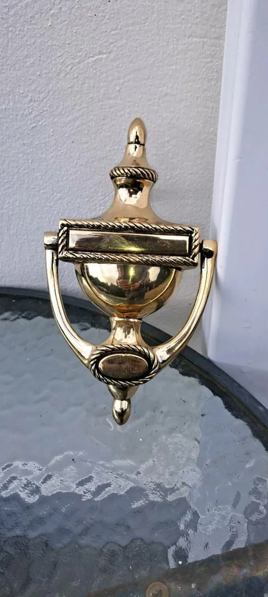 Old brass  door striker