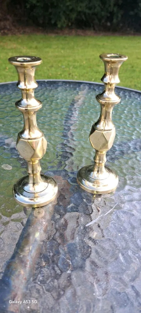 2 solid brass candle stick holders