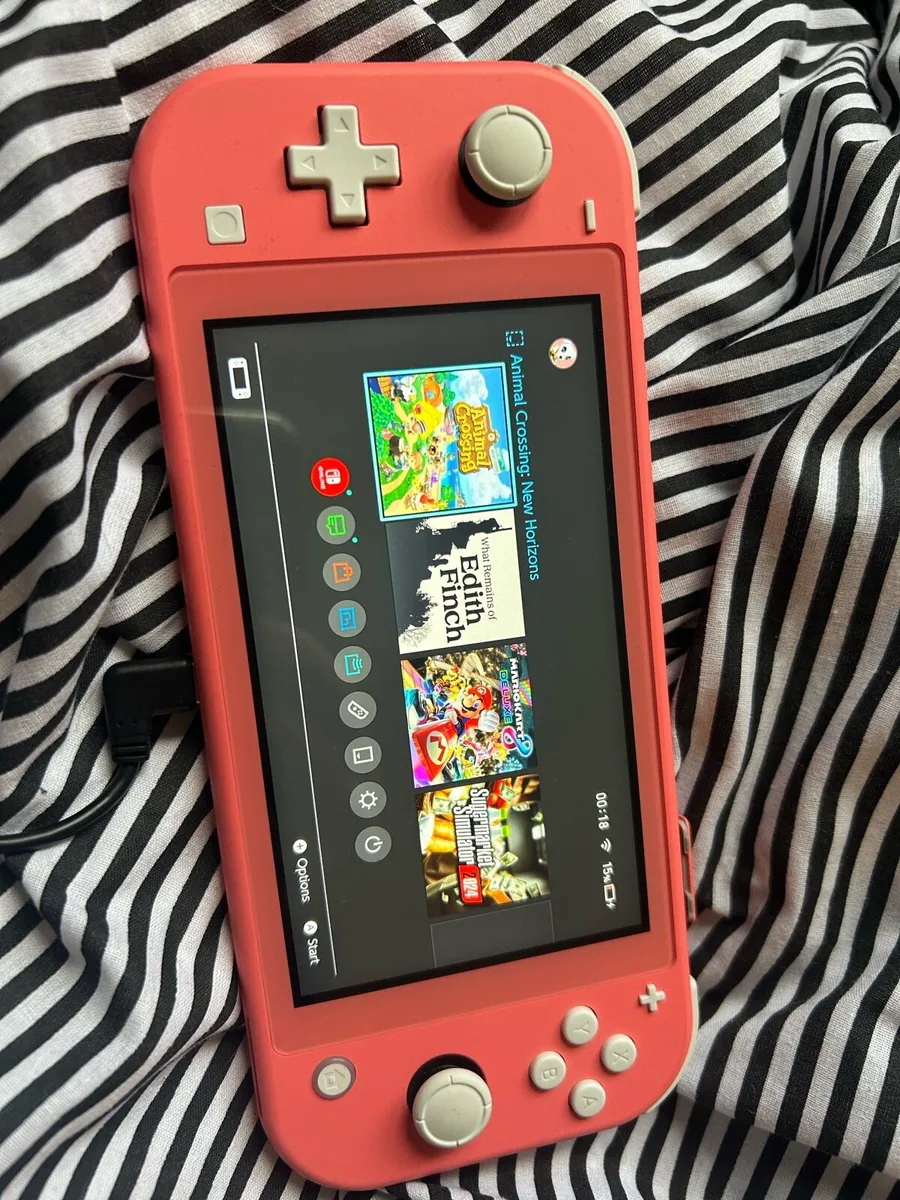 Nintendo Switch Lite With Animal Crossing - Image 1