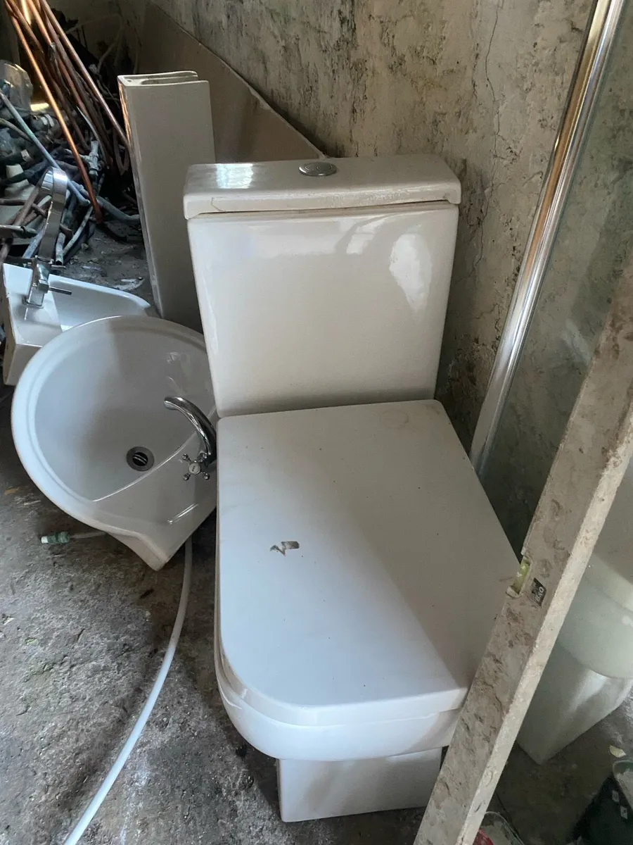 bathroom sinks and toilet - Image 1