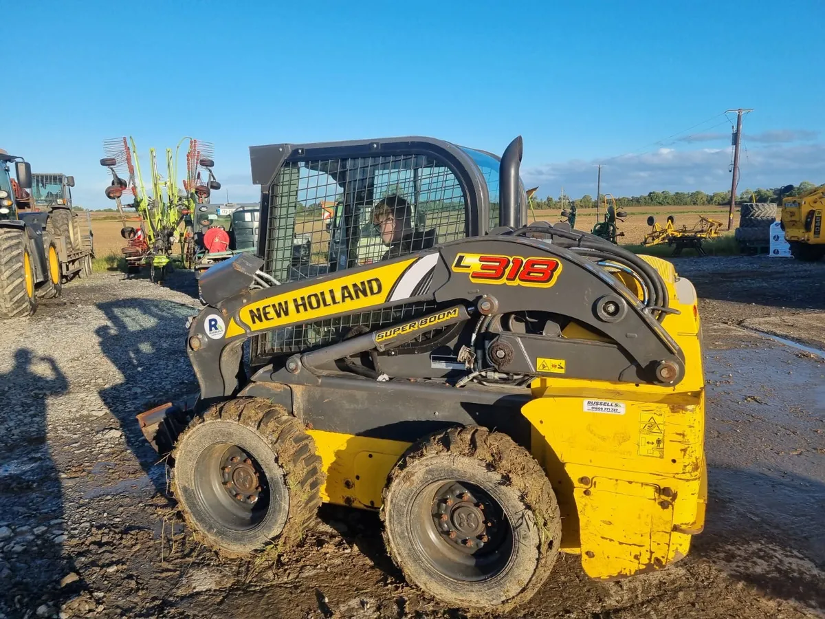 New Holland 318 skid steer - Image 2