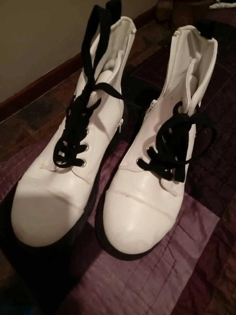 Boots and pair of sandals - Image 1