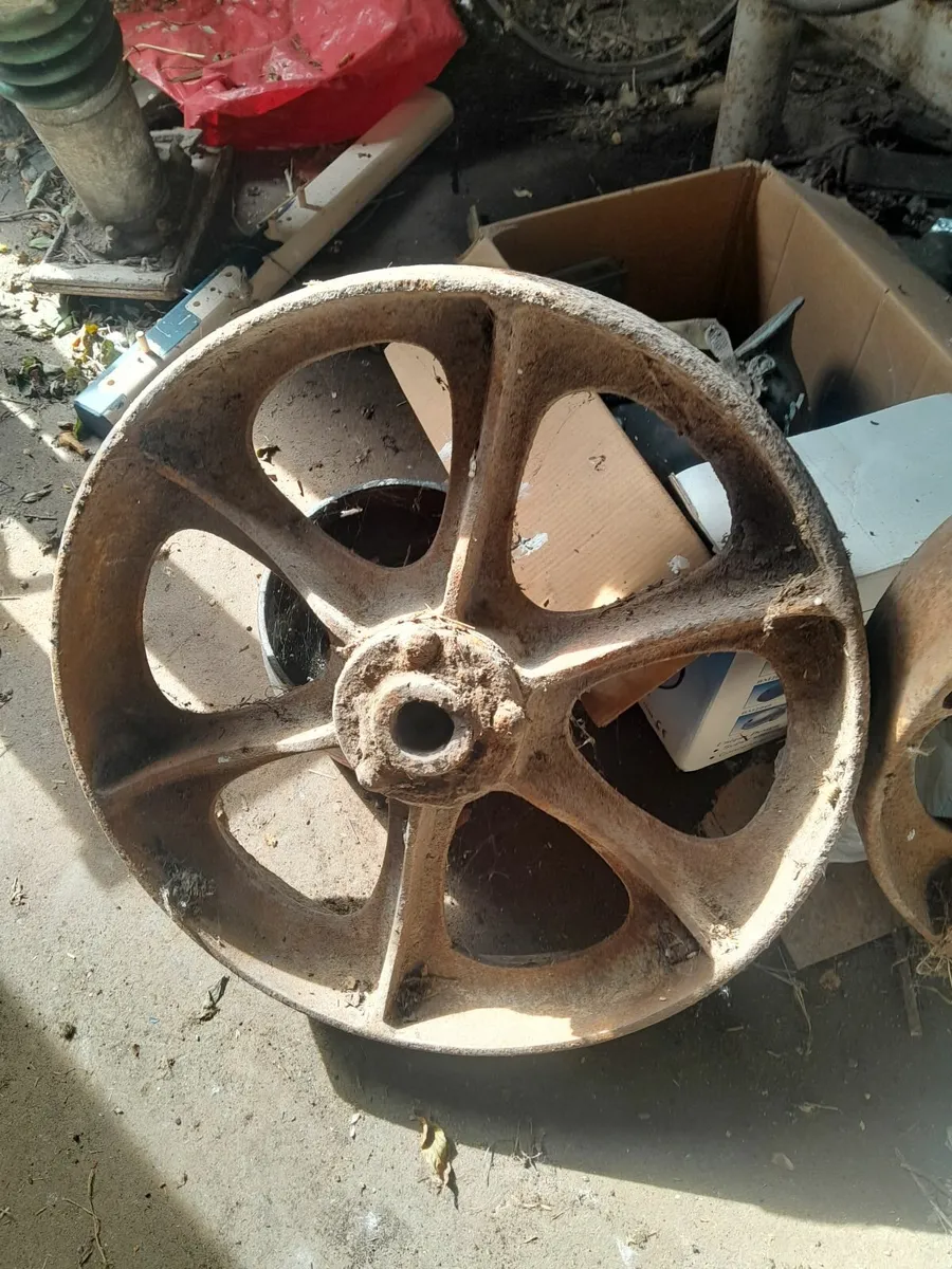 Two vintage cast iron  wheels - Image 2