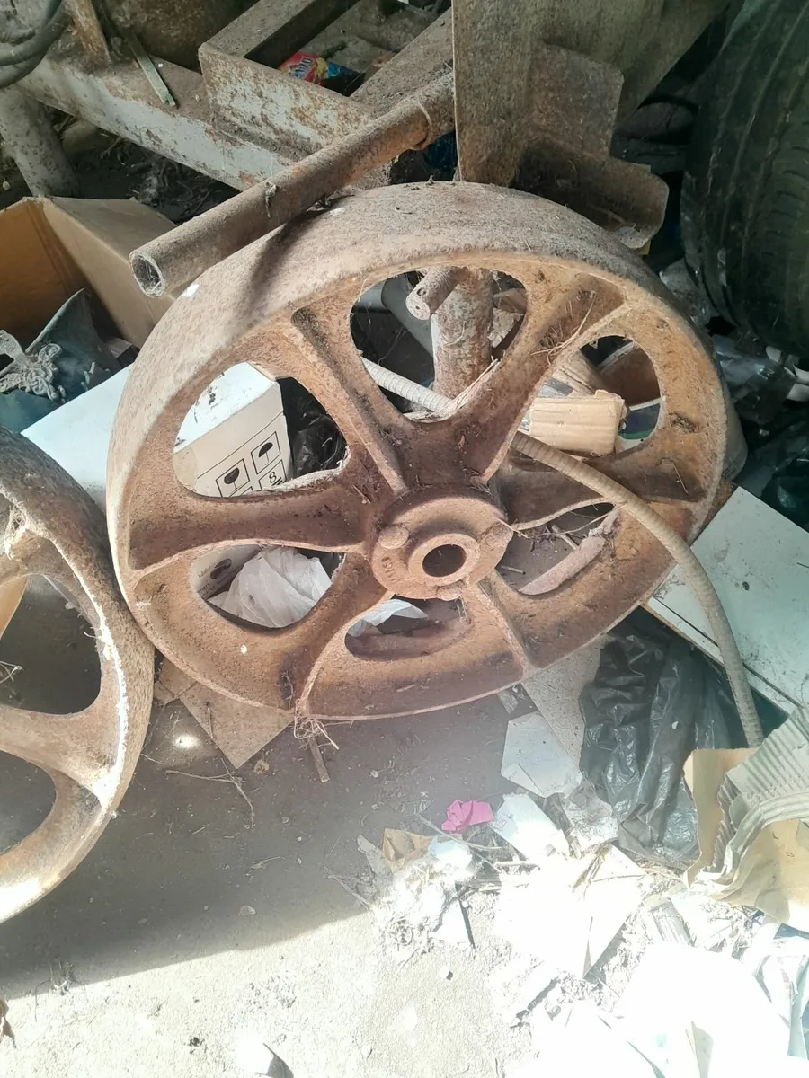 Two vintage cast iron  wheels - Image 3